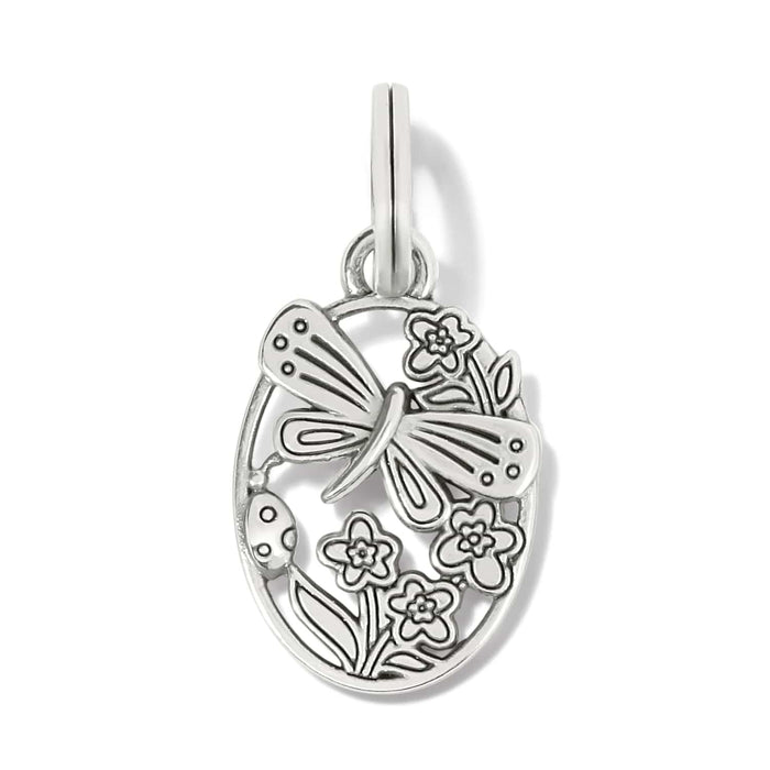 Brighton oval charm with silver-plated butterfly, flowers, and ladybug openwork design on a white background