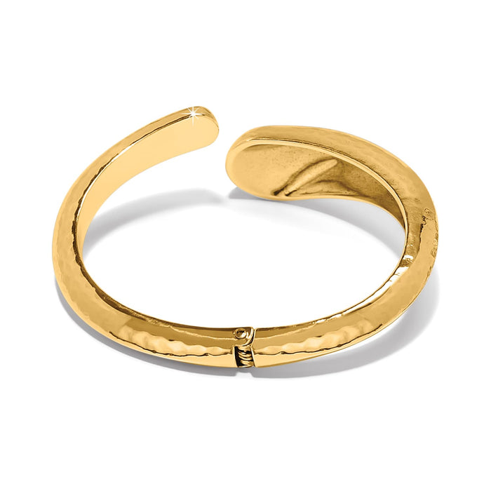 Brighton hinged cuff bracelet in gold-plated finish with hammered texture and open split design on a white background