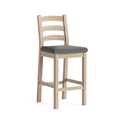 Wooden bar stool with a charcoal grey cushion on a white background
