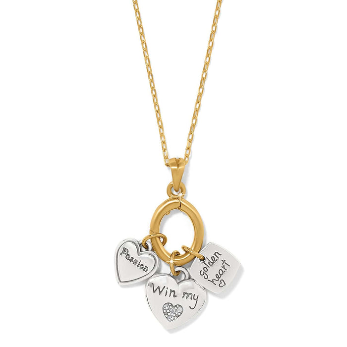 Brighton charm necklace with two-tone chain, heart charms engraved with Passion and Win my, and crystal accents on a white background