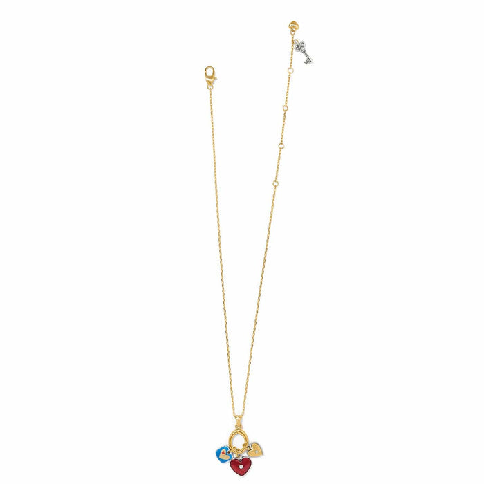 Brighton charm necklace with red, blue, and gold enamel heart charms on two-tone chain on a white background