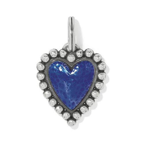 Brighton heart charm with blue enamel center and silver-plated beaded border on a white background