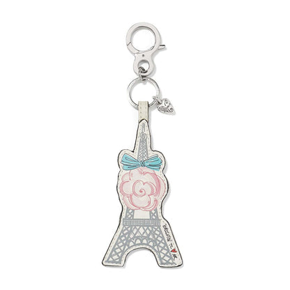 Brighton keychain with leather Eiffel Tower charm, pink rose, blue bow, and silver-tone clasp on a white background