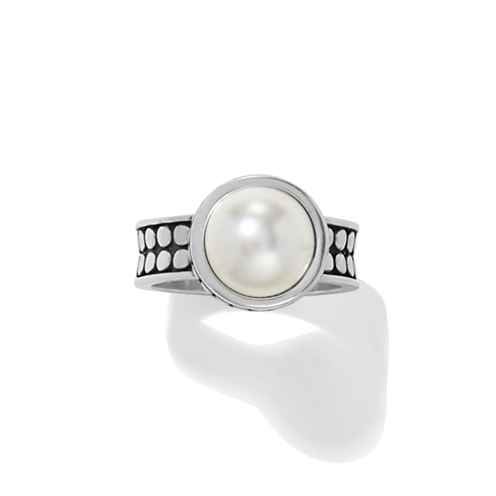 Brighton silver-plated ring with round glass pearl cabochon and dotted textured band on a white background
