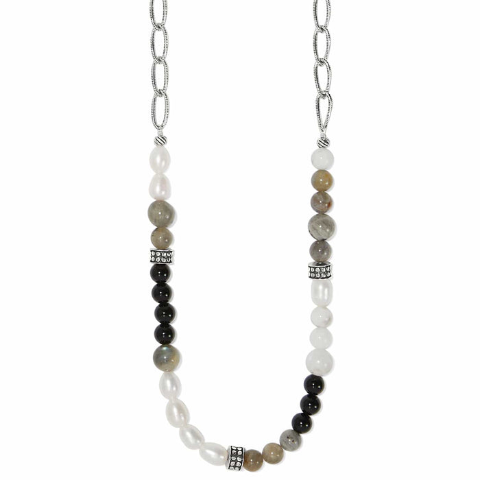 Brighton beaded necklace with pearls, black, gray, and white stones and silver-plated chain on a white background