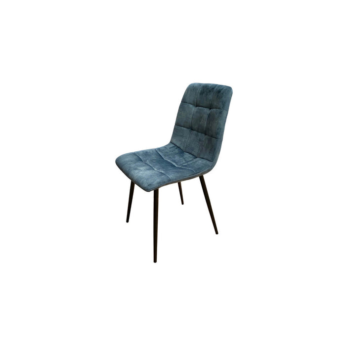 Blue velvet upholstered dining chair with black legs on a white background