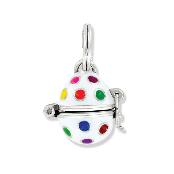 Brighton egg charm with white enamel and multicolored polka dots on silver-plated hinged design, on white background