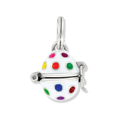 Brighton egg charm with white enamel and multicolored polka dots on silver-plated hinged design, on white background