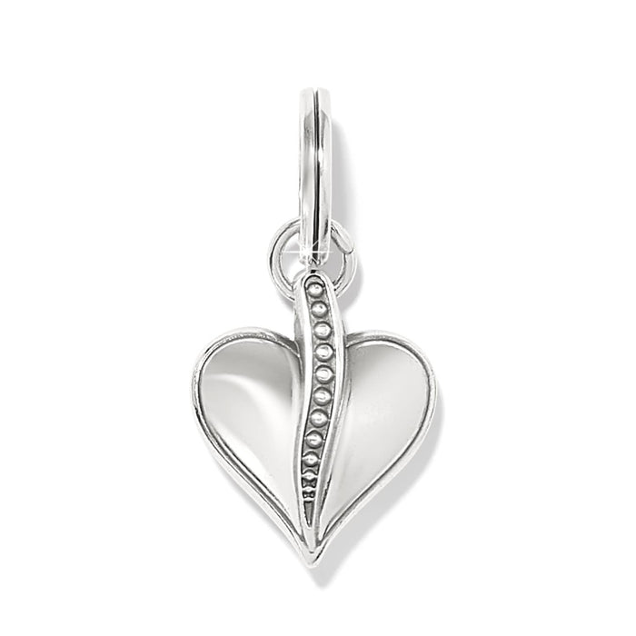 Brighton heart charm with silver-plated finish and beaded center detail down the middle on a white background