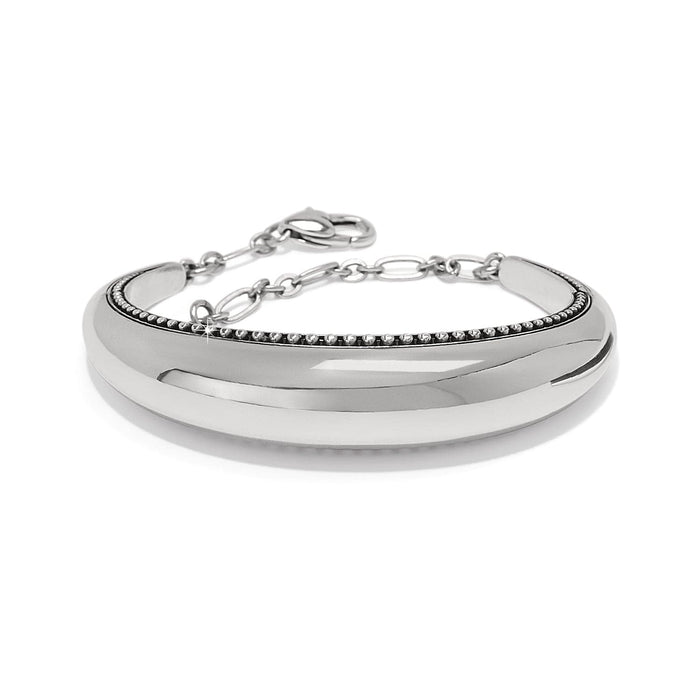 Brighton bangle bracelet with silver-plated domed finish, beaded trim, and adjustable chain clasp on a white background