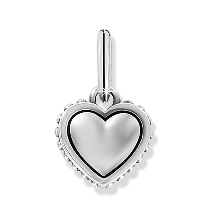 Brighton heart charm with silver-plated finish and beaded crystal border framing polished puffed heart on a white background