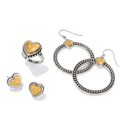 Brighton jewelry set with two-tone heart ring, heart stud earrings, and beaded hoop drop earrings on a white background