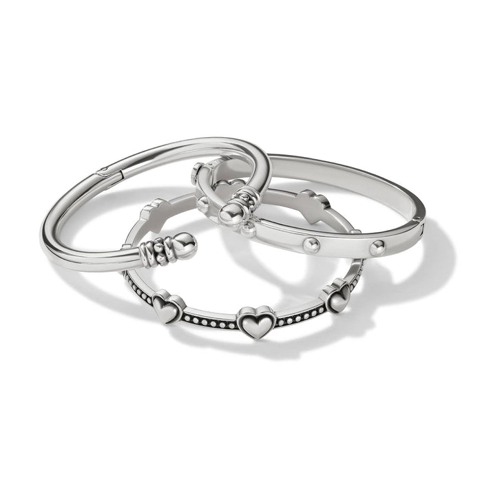 Brighton silver-plated bangle bracelet set with heart accents, beaded details, and studded band on a white background