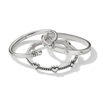 Brighton silver-plated bangle bracelet set with heart accents, beaded details, and studded band on a white background