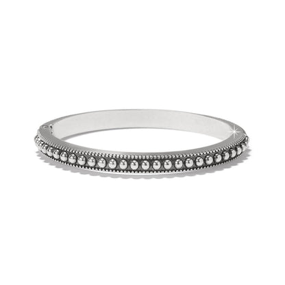 Brighton silver-plated bangle bracelet with row of polished beads and beaded edge trim on a white background