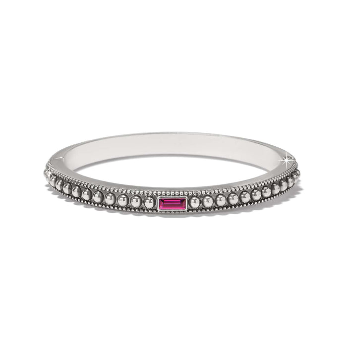 Brighton bangle bracelet with silver-plated beaded design and pink crystal baguette accent on a white background