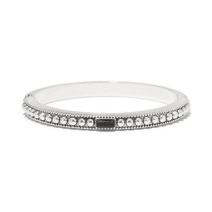 Brighton bangle bracelet with silver-plated beaded edges and small black crystal baguette accent on a white background