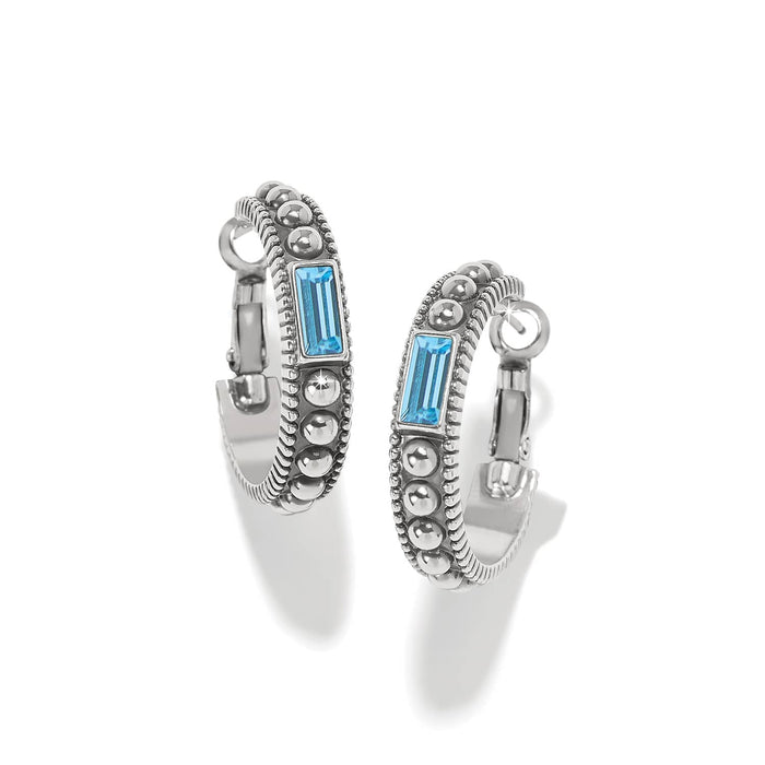 Brighton hoop earrings with silver-plated beaded design and blue baguette crystal accents on a white background