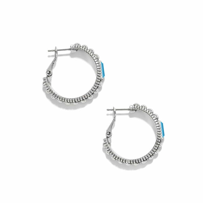 Brighton silver-plated hoop earrings with beaded edges and small blue crystal accents on a white background
