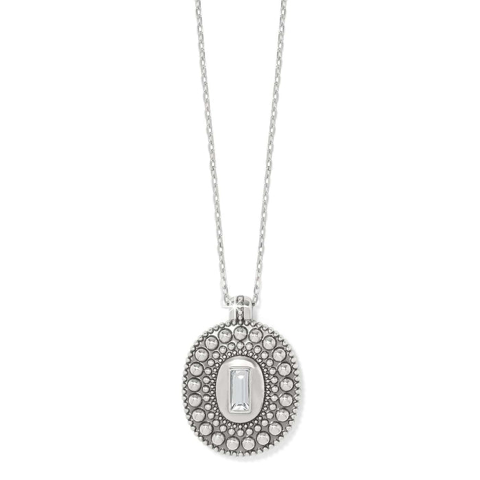 Brighton silver-plated pendant necklace with beaded oval medallion and rectangular crystal center on a white background