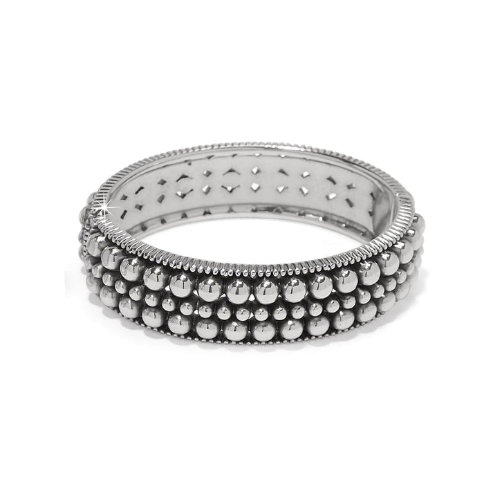 Brighton bangle bracelet with silver-plated beaded rows and textured edges on a white background