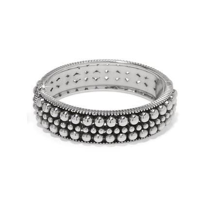 Brighton bangle bracelet with silver-plated beaded rows and textured edges on a white background