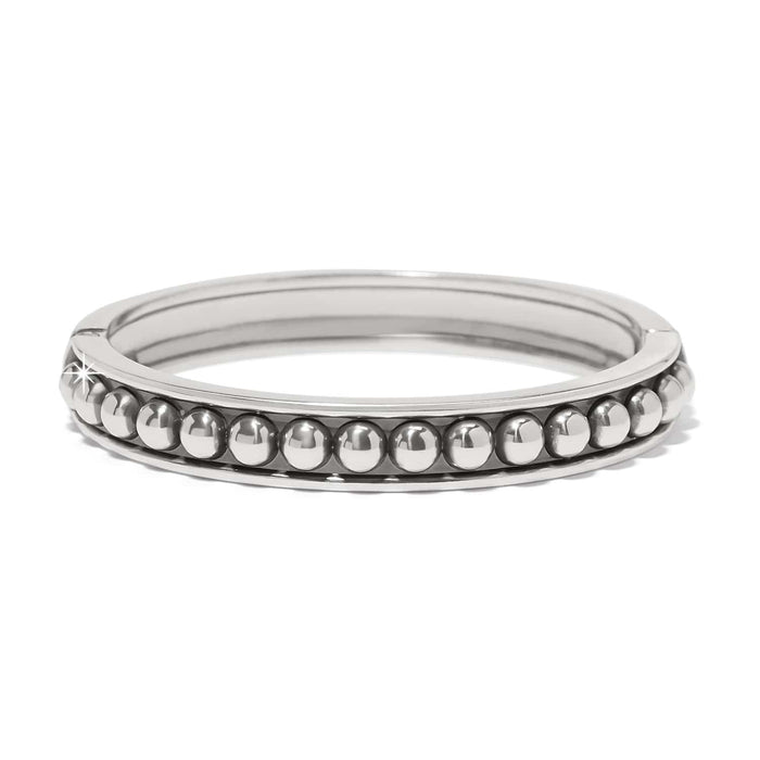 Brighton bangle bracelet with silver-plated beaded row detail and polished frame on a white background