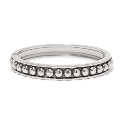 Brighton bangle bracelet with silver-plated beaded row detail and polished frame on a white background