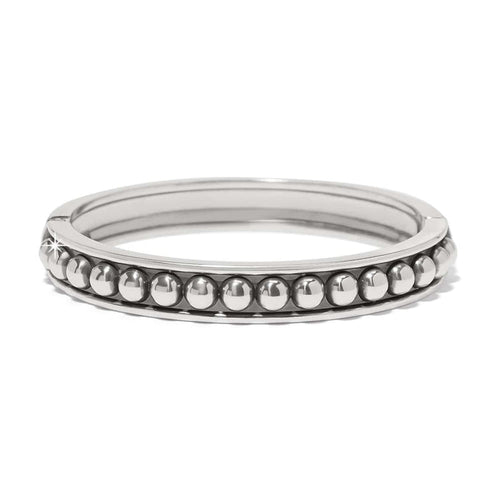 Brighton bangle bracelet with silver-plated beaded row detail and polished frame on a white background