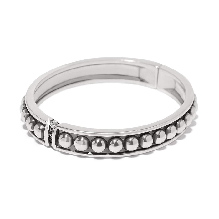 Brighton hinged bangle bracelet with silver-plated beaded row detail and polished band on a white background