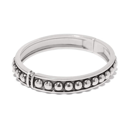 Brighton hinged bangle bracelet with silver-plated beaded row detail and polished band on a white background