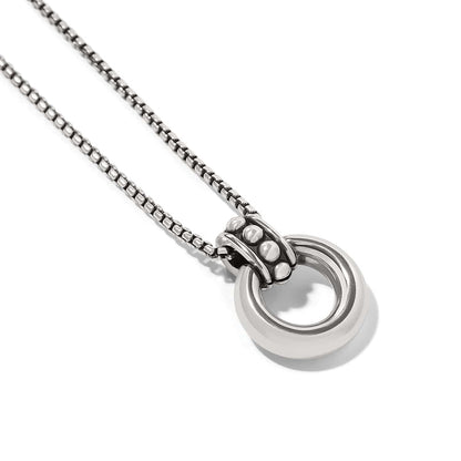Brighton pendant necklace with silver-plated circular ring, beaded bail, and box chain on a white background