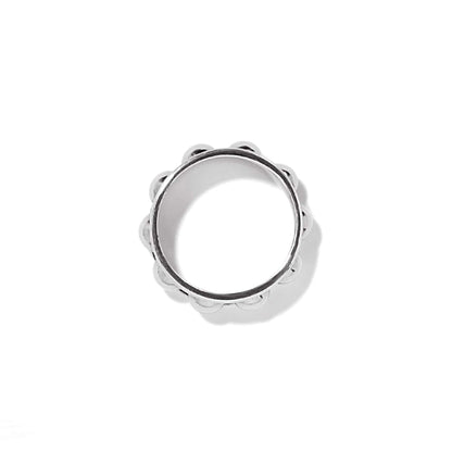 Brighton ring shown from the side with silver-plated scalloped bead edge detailing on a white background