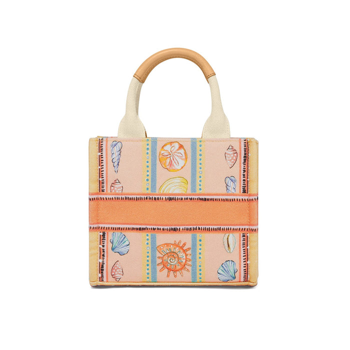 Brighton canvas tote handbag with illustrated seashell print, orange stripes, and tan leather-topped handles on a white background