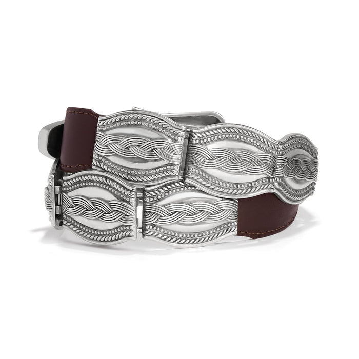 Brighton brown leather belt with ornate silver-tone braided rope buckle plates and beaded edging on a white background