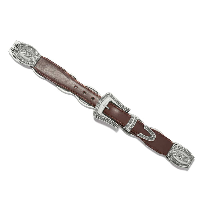 Brighton brown leather belt with silver-tone braided buckle and decorative end caps on a white background