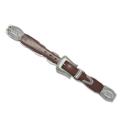 Brighton brown leather belt with silver-tone braided buckle and decorative end caps on a white background