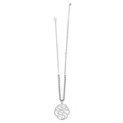Brighton pendant necklace with silver-plated beaded chain and hammered swirl medallion pendant on a white background