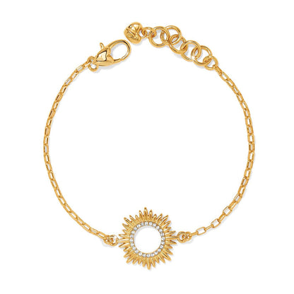 Brighton bracelet with gold-plated chain and crystal-accented sunburst centerpiece, featuring lobster clasp closure on a white background