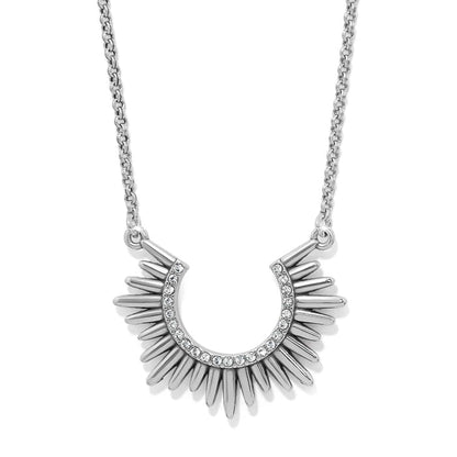 Brighton necklace with silver-tone sunburst pendant and crystal-accented arch on a white background