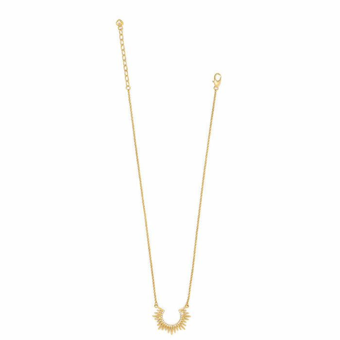 Brighton gold-plated necklace with sunburst pendant featuring crystal accents and lobster clasp on a white background
