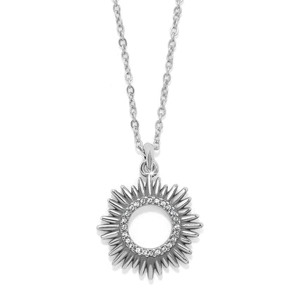 Brighton pendant necklace with silver-tone sunburst design and crystal-accented inner circle on a white background