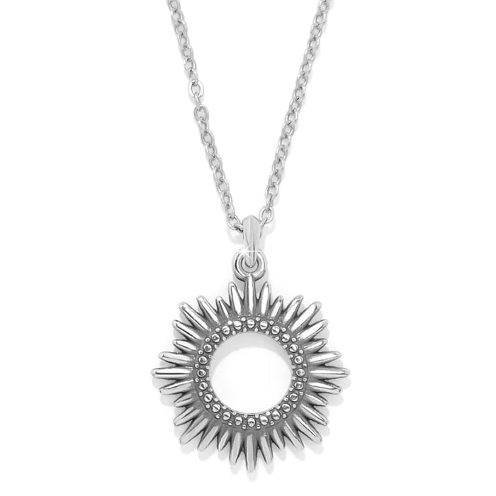 Brighton pendant necklace with silver-tone sunburst design and beaded inner ring on a white background