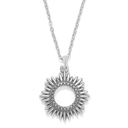 Brighton pendant necklace with silver-tone sunburst design and beaded inner ring on a white background