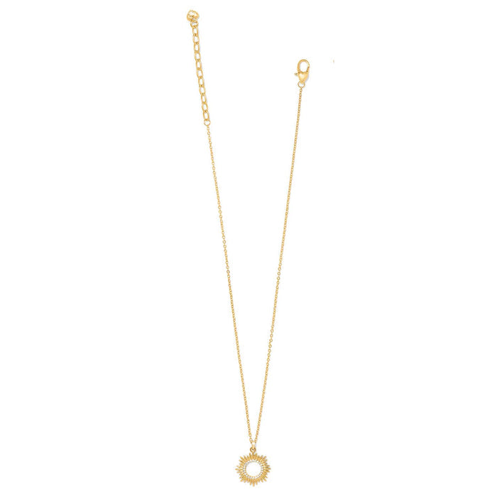 Brighton gold-plated pendant necklace with sunburst charm and crystal accents, shown with lobster clasp on white background