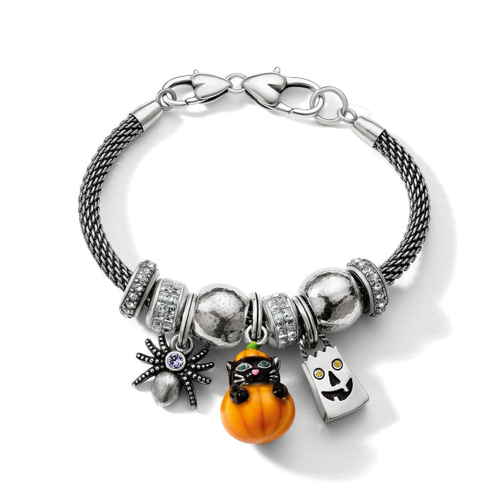 Brighton silver-plated charm bracelet with Halloween pumpkin, black cat, spider, ghost charms and crystal beads on white background