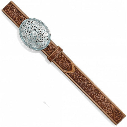 Brighton tooled brown leather belt with ornate round silver-tone scrollwork buckle on a white background