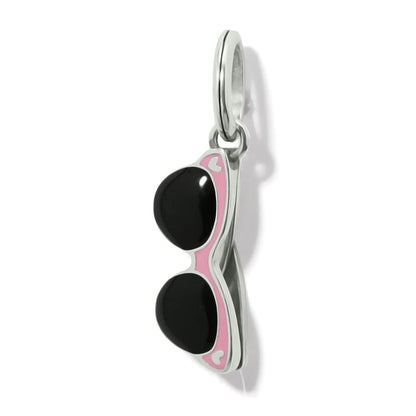 Brighton sunglasses charm with black enamel lenses and pink enamel frame in silver-plated finish on a white background
