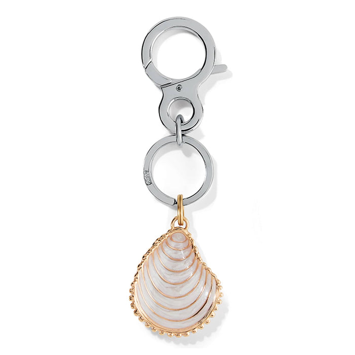 Brighton keychain with gold-plated shell charm in white enamel and silver-tone clip on a white background