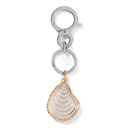 Brighton keychain with gold-plated shell charm in white enamel and silver-tone clip on a white background